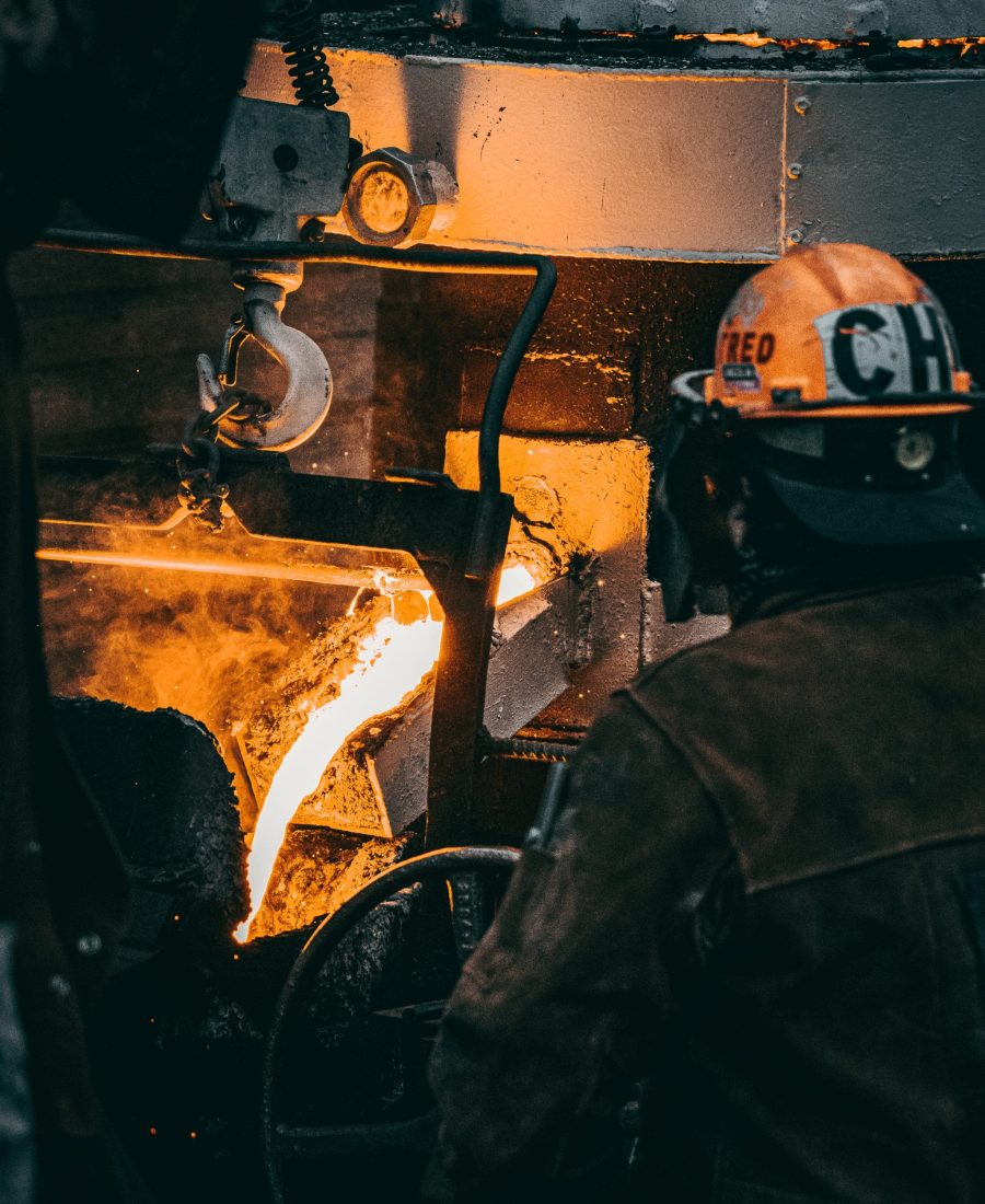 vertical-shot-adult-industrial-worker-uniforms-melting-metal-factory